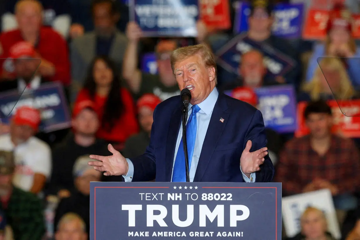 FILE PHOTO: Republican presidential candidate Trump campaigns in New Hampshire