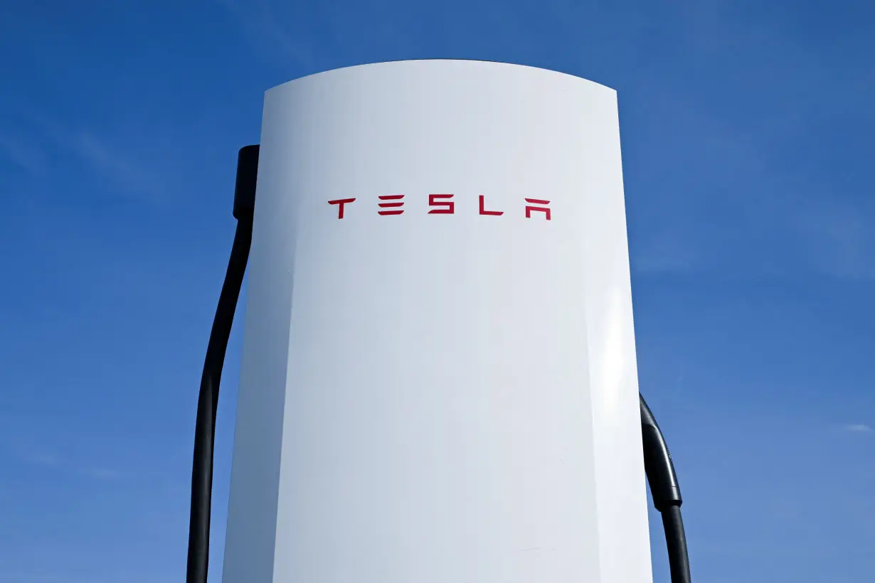 FILE PHOTO: A Tesla electric car charging station near Berlin