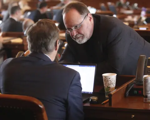 In the Kansas House, when lobbyists ask for new laws, their names go on the bills