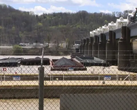 Ohio River near Pittsburgh is closed as crews search for missing barge, one of 26 that broke loose