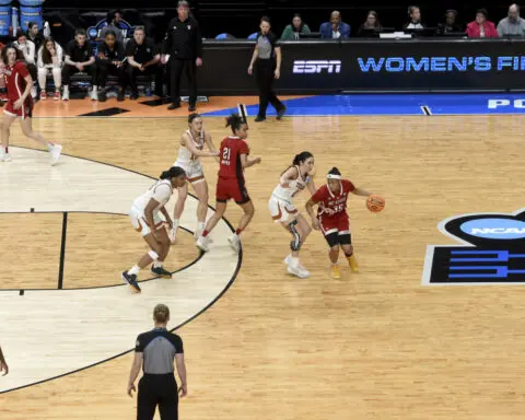 Court for women's NCAA Tournament in Portland has 3-point lines with different distances