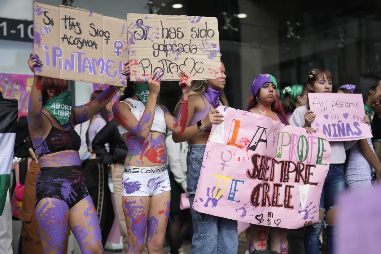 Facing historic shifts, Latin American women bathe streets in purple on International Women's Day