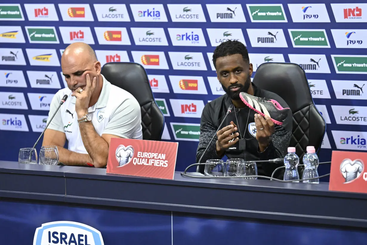 Israeli soccer team captain displays shoe of kidnapped child ahead of qualifying match in Hungary