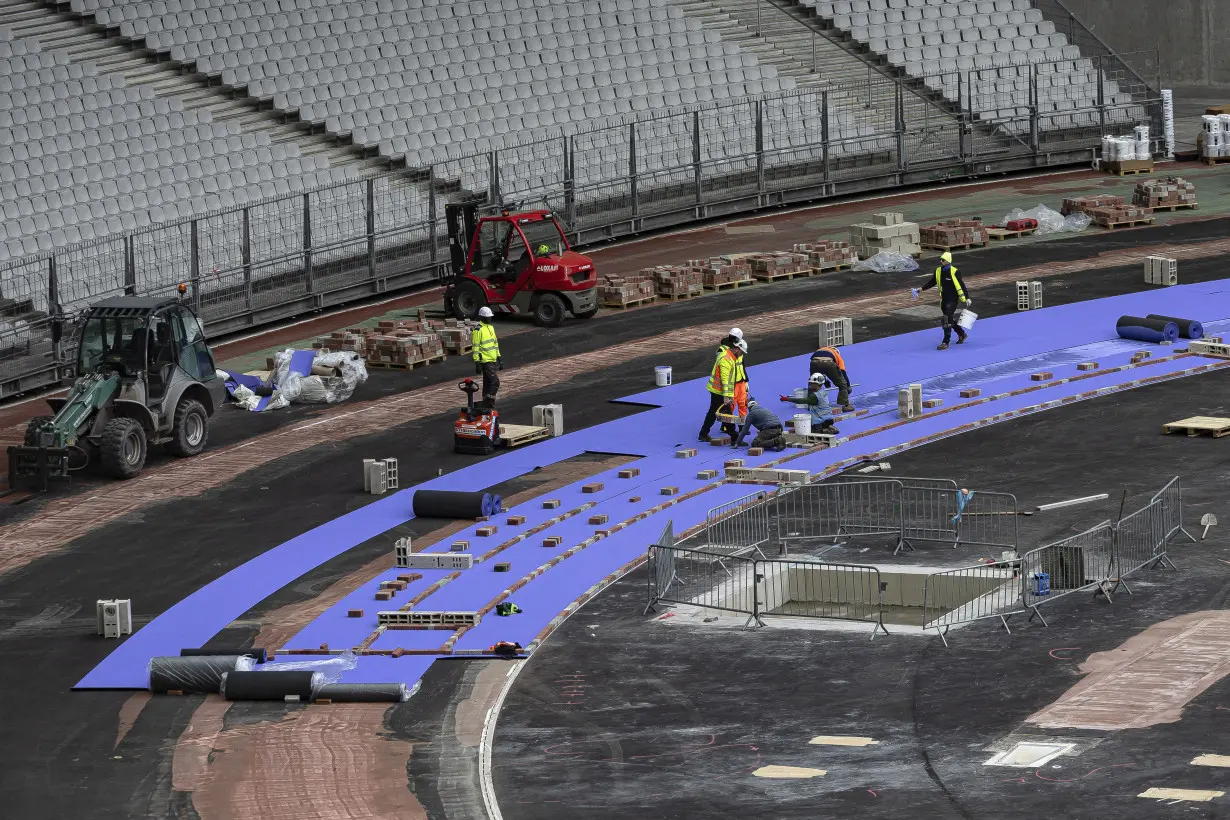 Seeing purple: Fans get a new track color and maybe record-breaking times at Paris Olympics