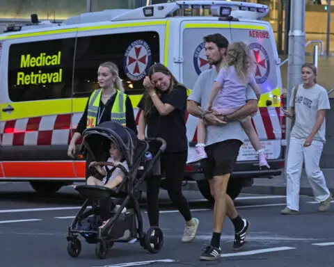 Multiple people stabbed and 1 person shot at a Sydney shopping center, media say