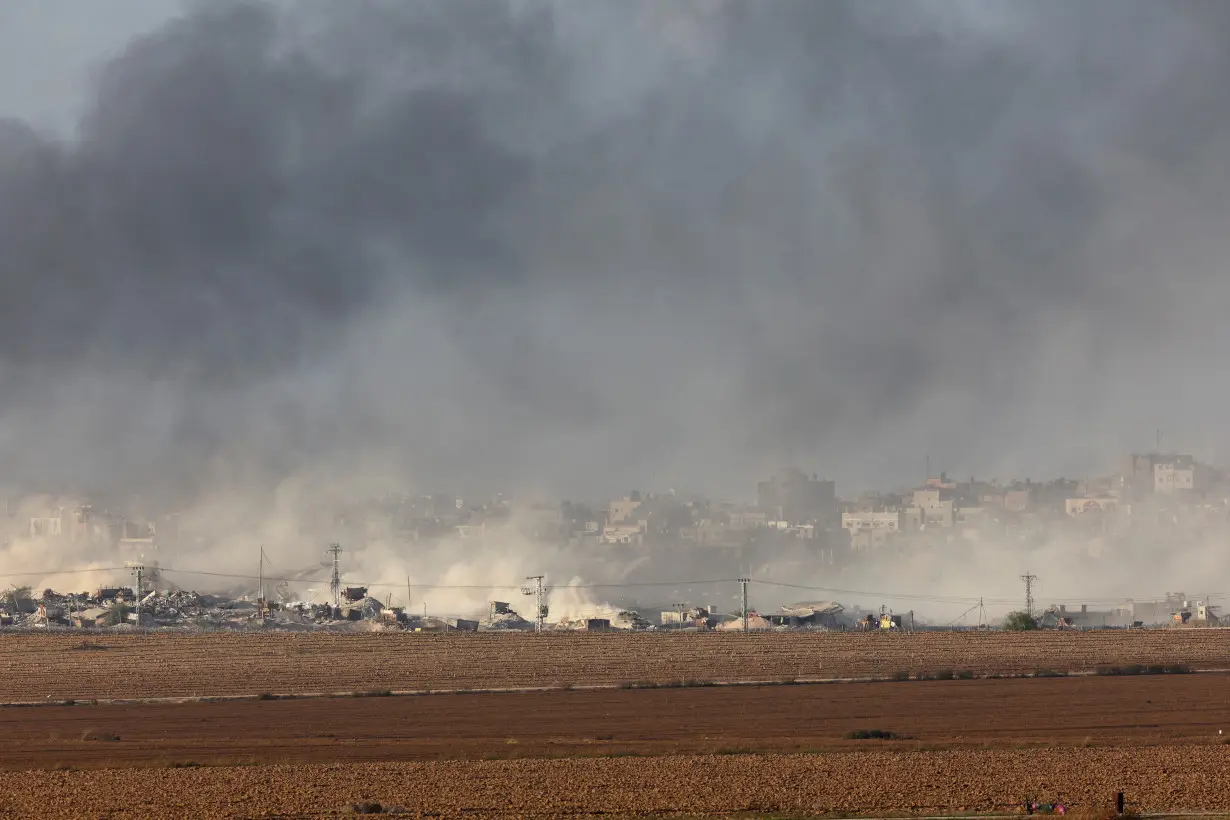 Smoke rises over Gaza, amid the ongoing conflict between Israel and the Palestinian Islamist group Hamas, as seen from southern Israel