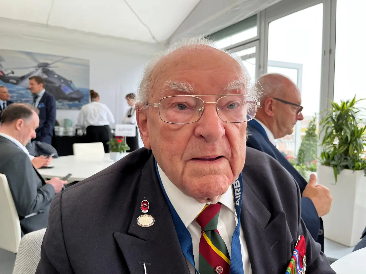 Veteran Ken Hay, 98, an ambassador for the British Normandy Memorial, looks on, in Fairford