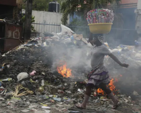 Haiti's transitional council names a new prime minister in the hopes of quelling stifling violence