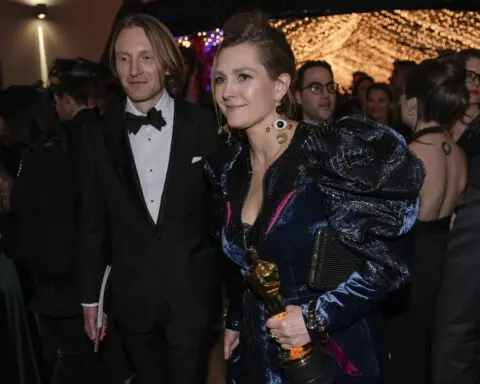 'Oppenheimer' crew keeps it low key, other winners revel at Vanity Fair's Oscar after-party