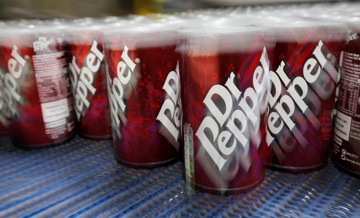 Aluminium Dr Pepper cans leave the production line at Ball Corporation, Wakefield