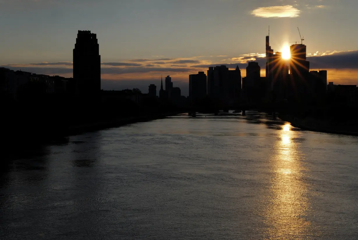 The skyline of the banking district is seen during sunset in Frankfurt