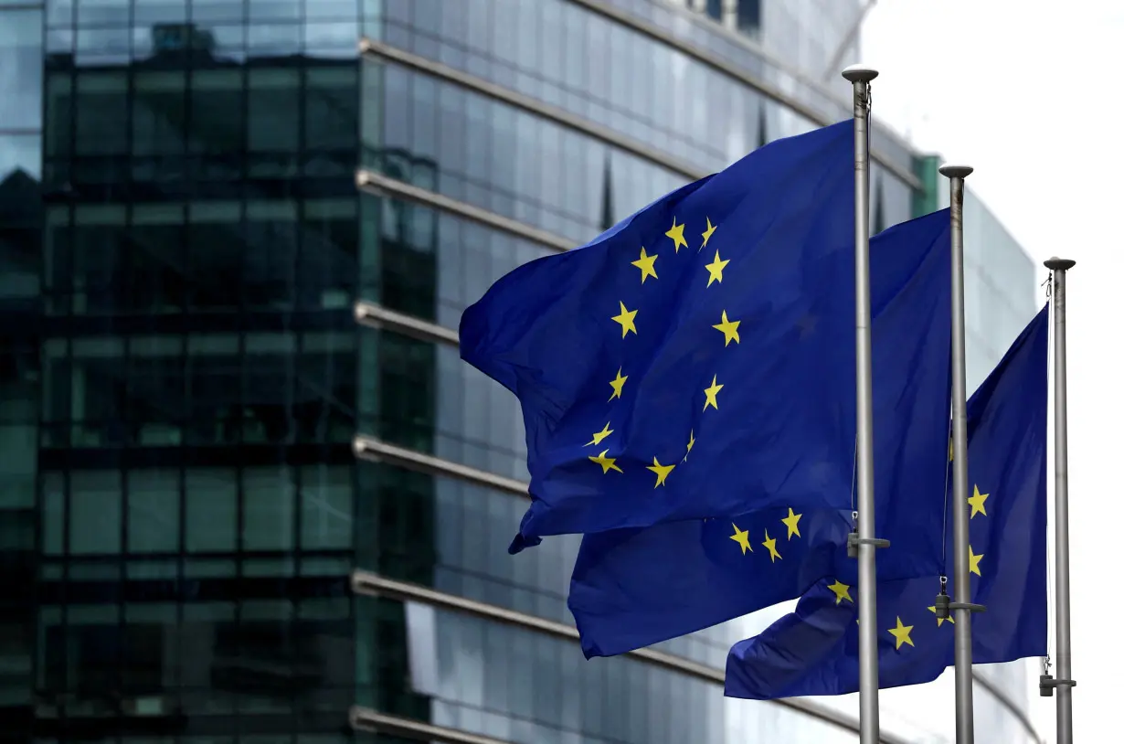 FILE PHOTO: European flags fly outside the European Commission headquarters in Brussels