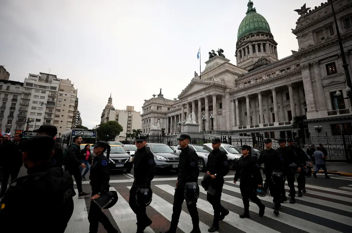 FILE PHOTO: Demonstrators protest outside the National Congress in Buenos Aires