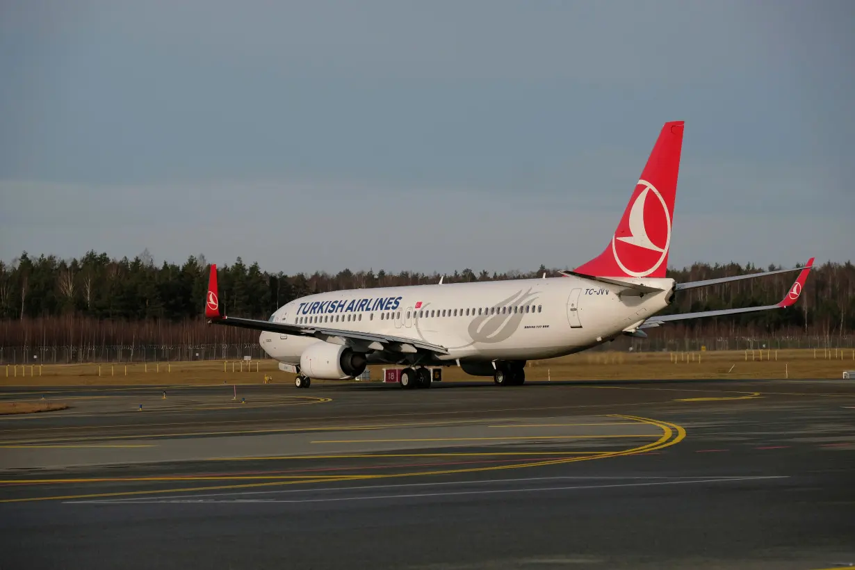 Turkish Airlines Boeing 737-800 plane TC-JVV taxies to take-off in Riga International Airport