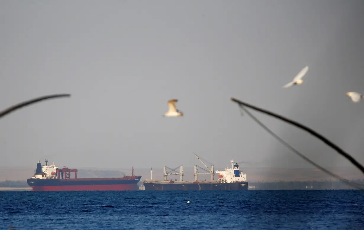 Container ships cross the Gulf of Suez towards the Red Sea before entering the Suez Canal, near Ismailia port city, northeast of Cairo