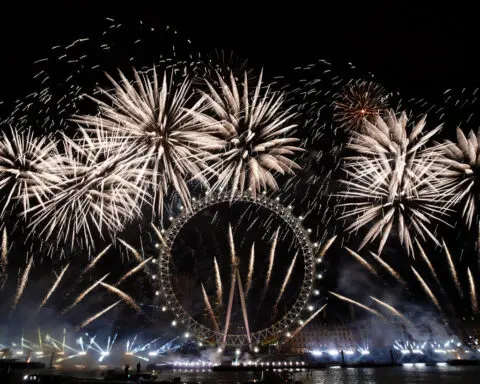 New Year's Eve sweeps across the globe, but wars cast a shadow on 2024