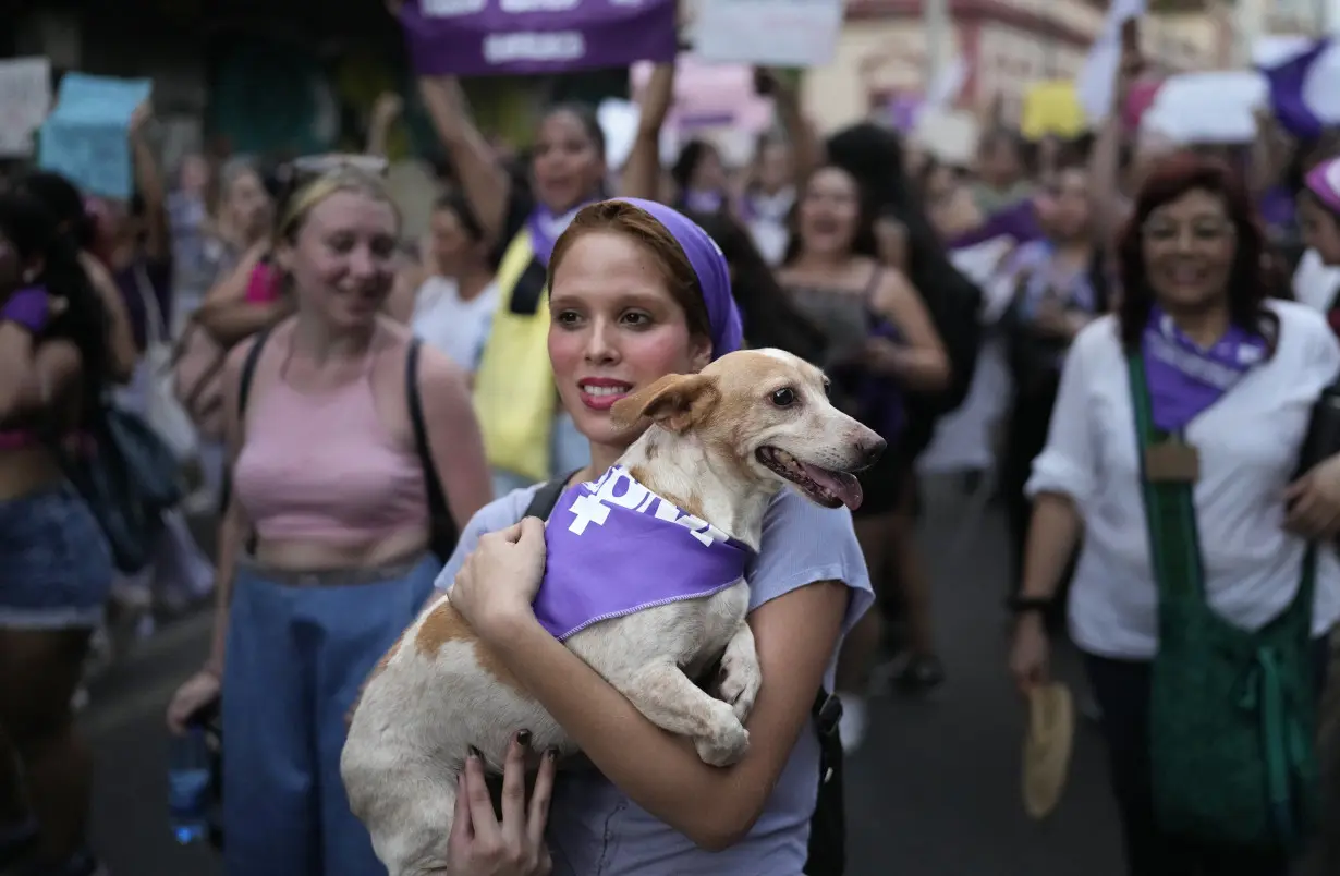 Facing historic shifts, Latin American women bathe streets in purple on International Women's Day