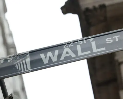 Wall Street stocks finish higher as investors focus on Fed moves