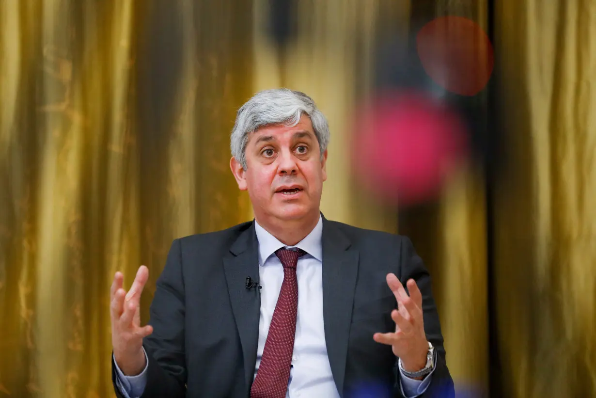 FILE PHOTO: ECB governing council member Mario Centeno speaks during an interview with Reuters, in Lisbon