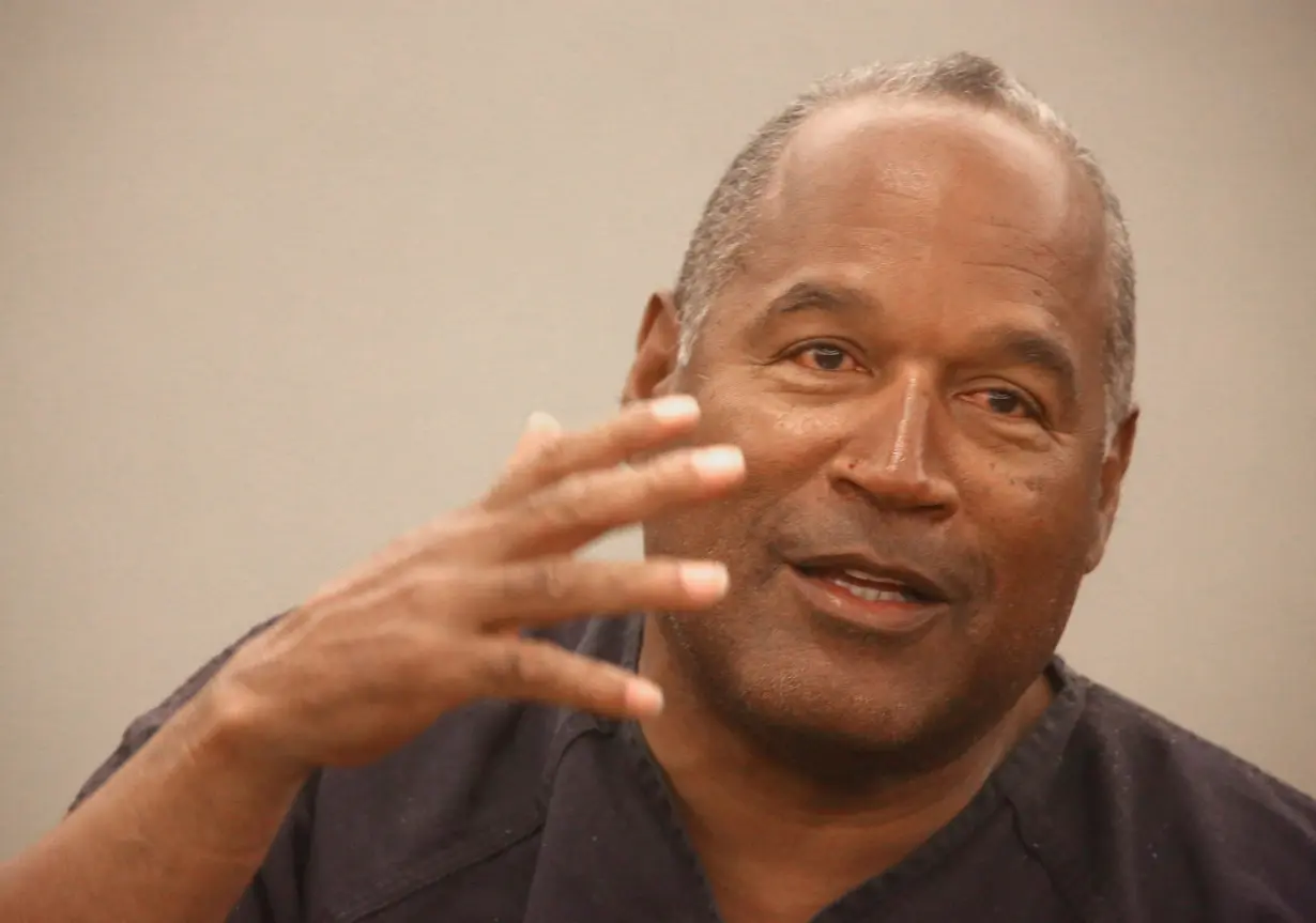 FILE PHOTO: O.J. Simpson testifies during an evidentiary hearing in Clark County District Court in Las Vegas