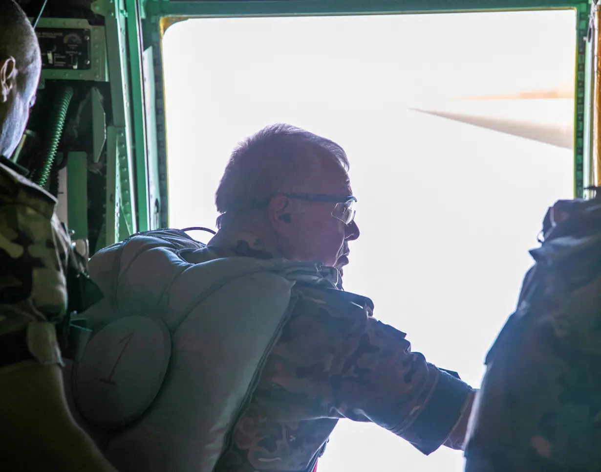 Jordan's King Abdullah II participates in an airdrop of aid to Gaza