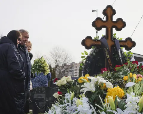 A Russian Orthodox priest who took part in services for Navalny is suspended by the patriarch