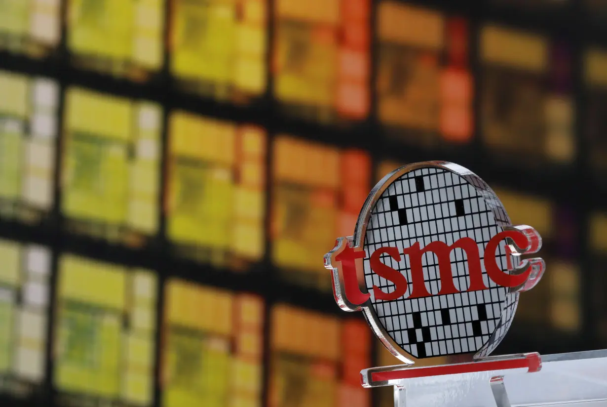 FILE PHOTO: A logo of Taiwan Semiconductor Manufacturing Co (TSMC) is seen at its headquarters in Hsinchu