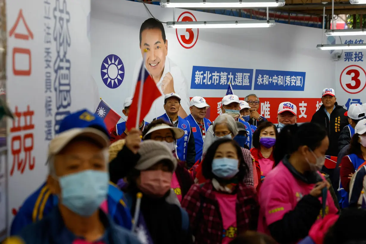 Supporters of Hou Yu-ih, a candidate for Taiwan's presidency from the main opposition party Kuomintang (KMT) attend a campaign event in New Taipei City