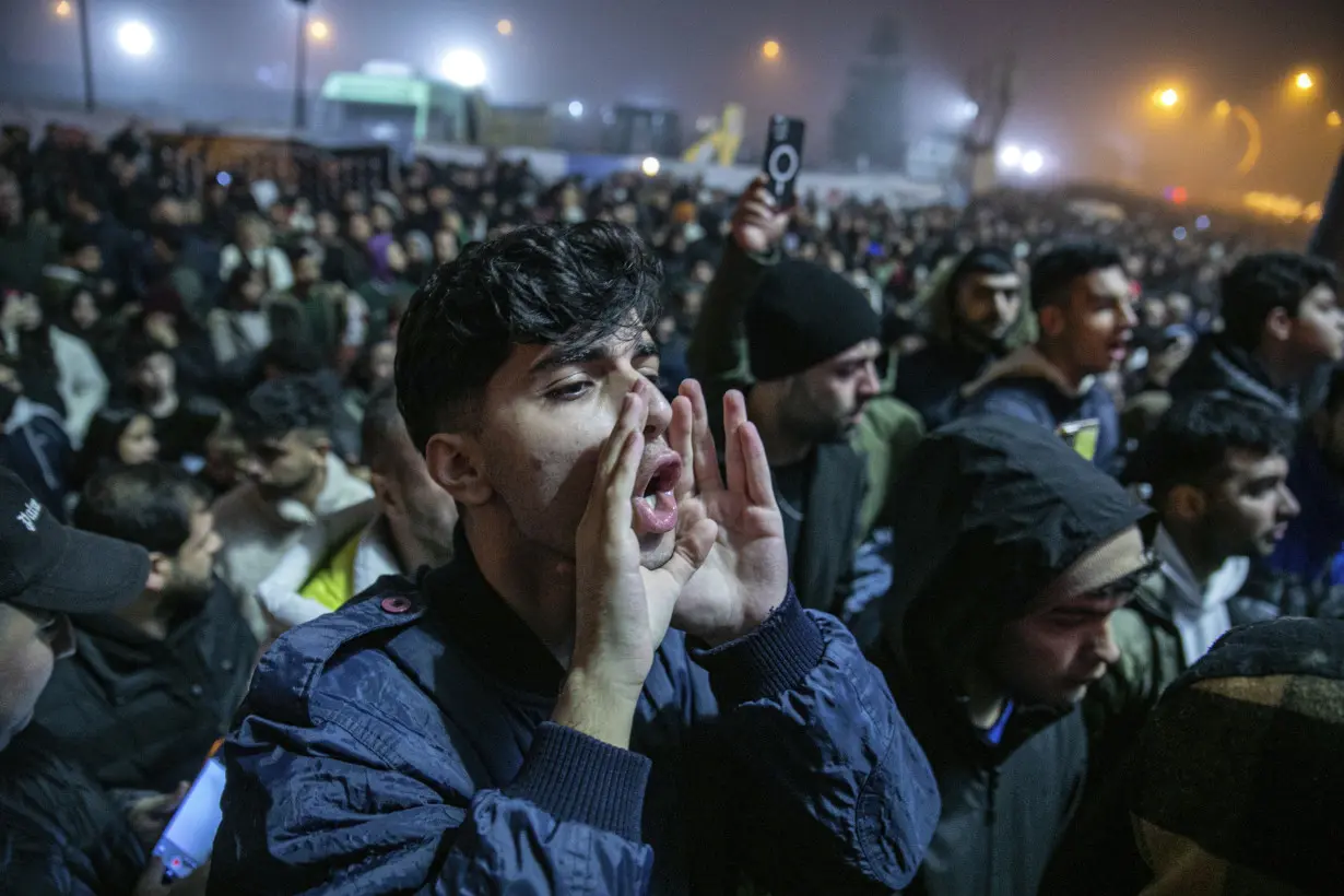 Turkey mourns tens of thousands dead, surrounded by the ruins of last year's earthquake