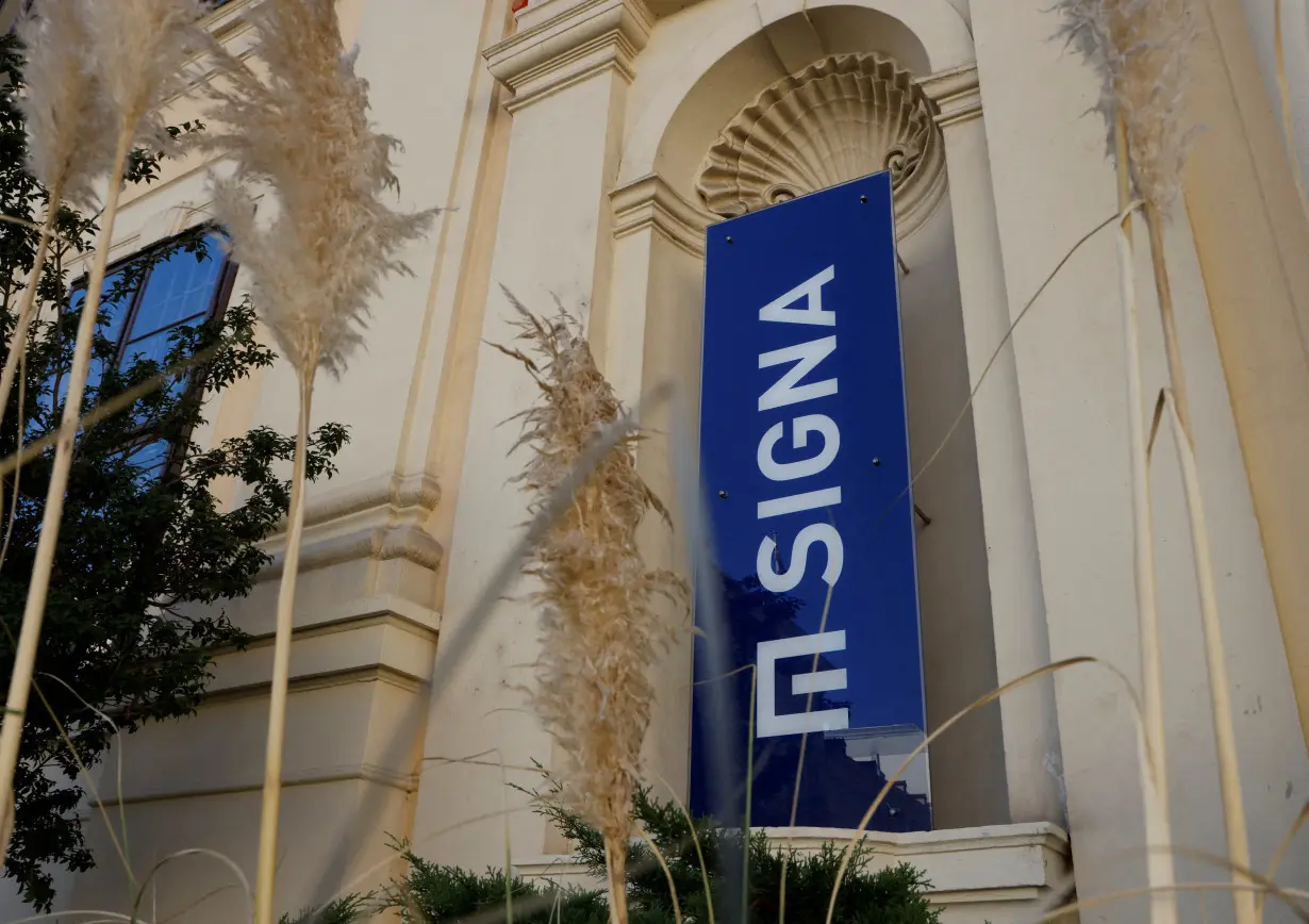 FILE PHOTO: A view of the sign of Signa Holding on their headquarters in Vienna