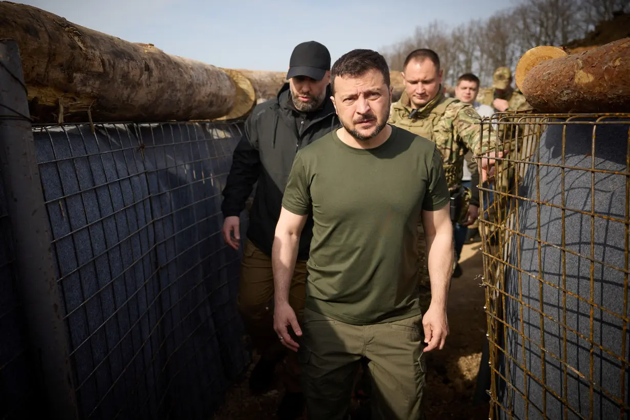 FILE PHOTO: Ukraine's President Zelenskiy inspects new fortifications for Ukrainian servicemen in Kharkiv region