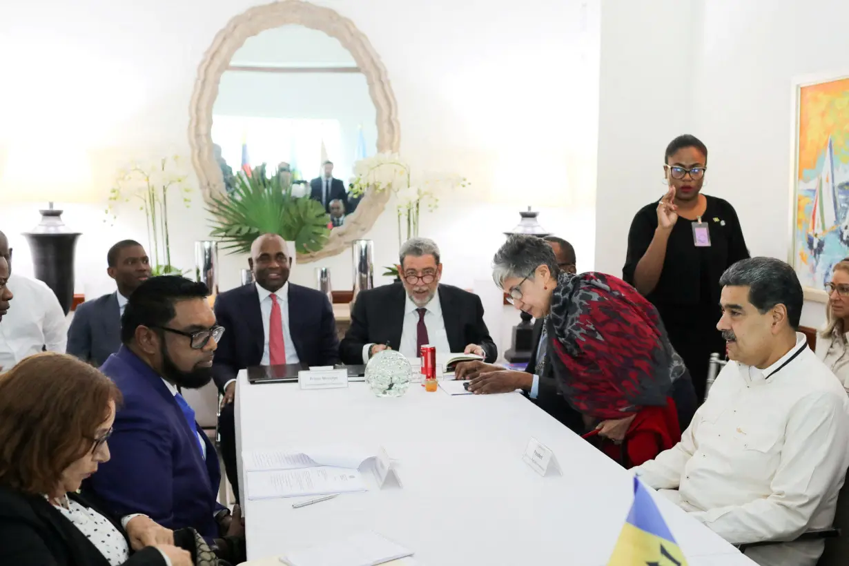 FILE PHOTO: Venezuela's President Nicolas Maduro meets with his Guyanese counterpart Irfaan Ali, in Kingstown