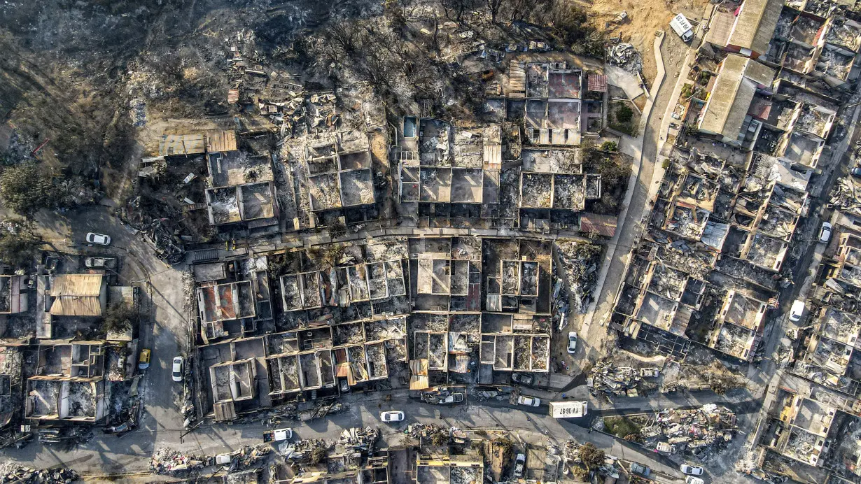 Survivors of Chile wildfires search through debris as death toll reaches 122