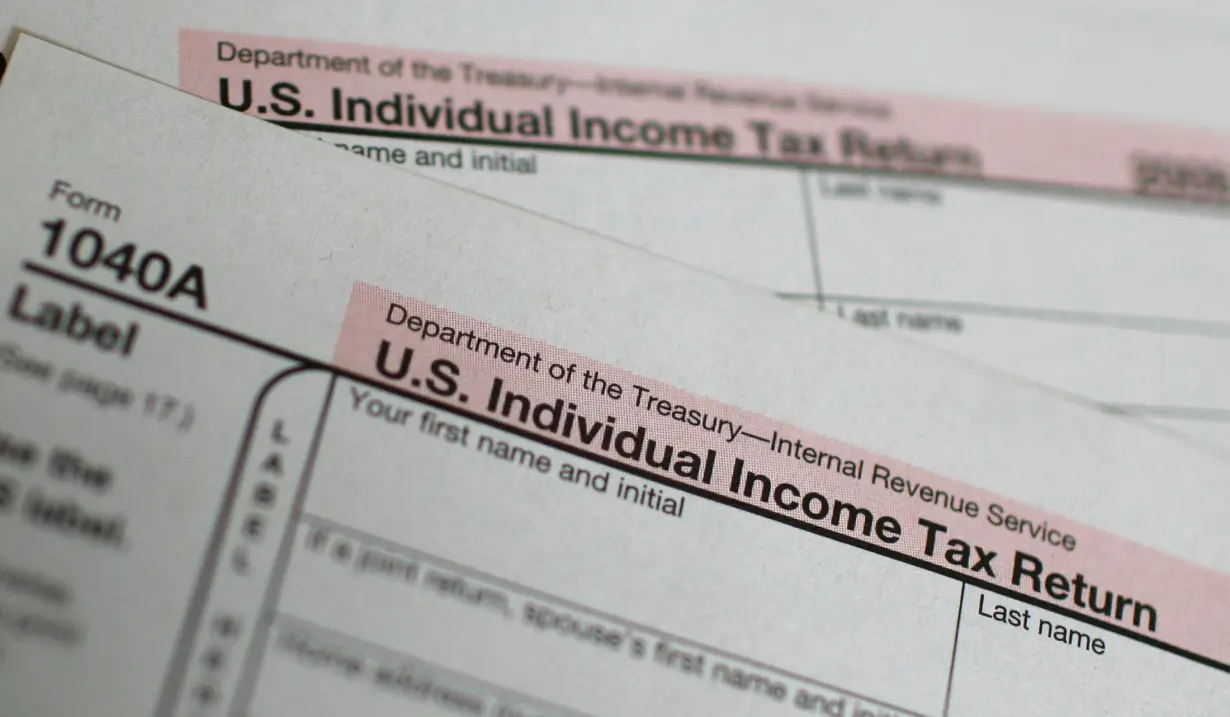 FILE PHOTO: U.S. 1040A Individual Income Tax form is seen at a U.S. Post office in New York