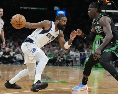 Celtics overcome Doncic's triple-double to beat Mavericks 138-110 for 10th straight win