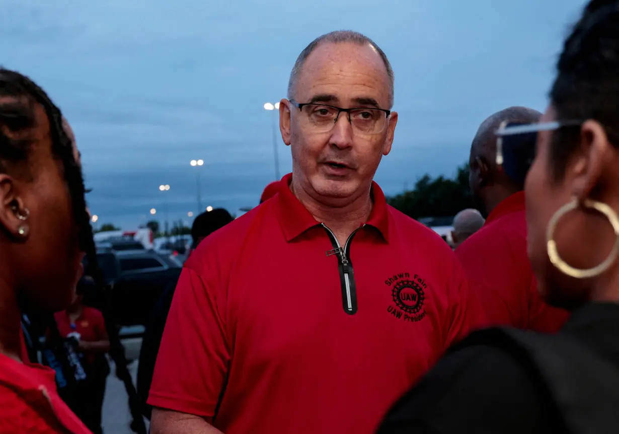 FILE PHOTO: United Auto Workers President Shawn Fain greets UAW autoworkers to mark the beginning of contract negotiations in Sterling Heights