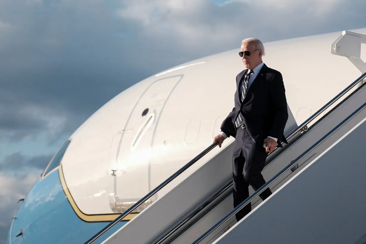 FILE PHOTO: U.S. President Joe Biden disembarks from Air Force One at Dover Air Force Base, in Dover
