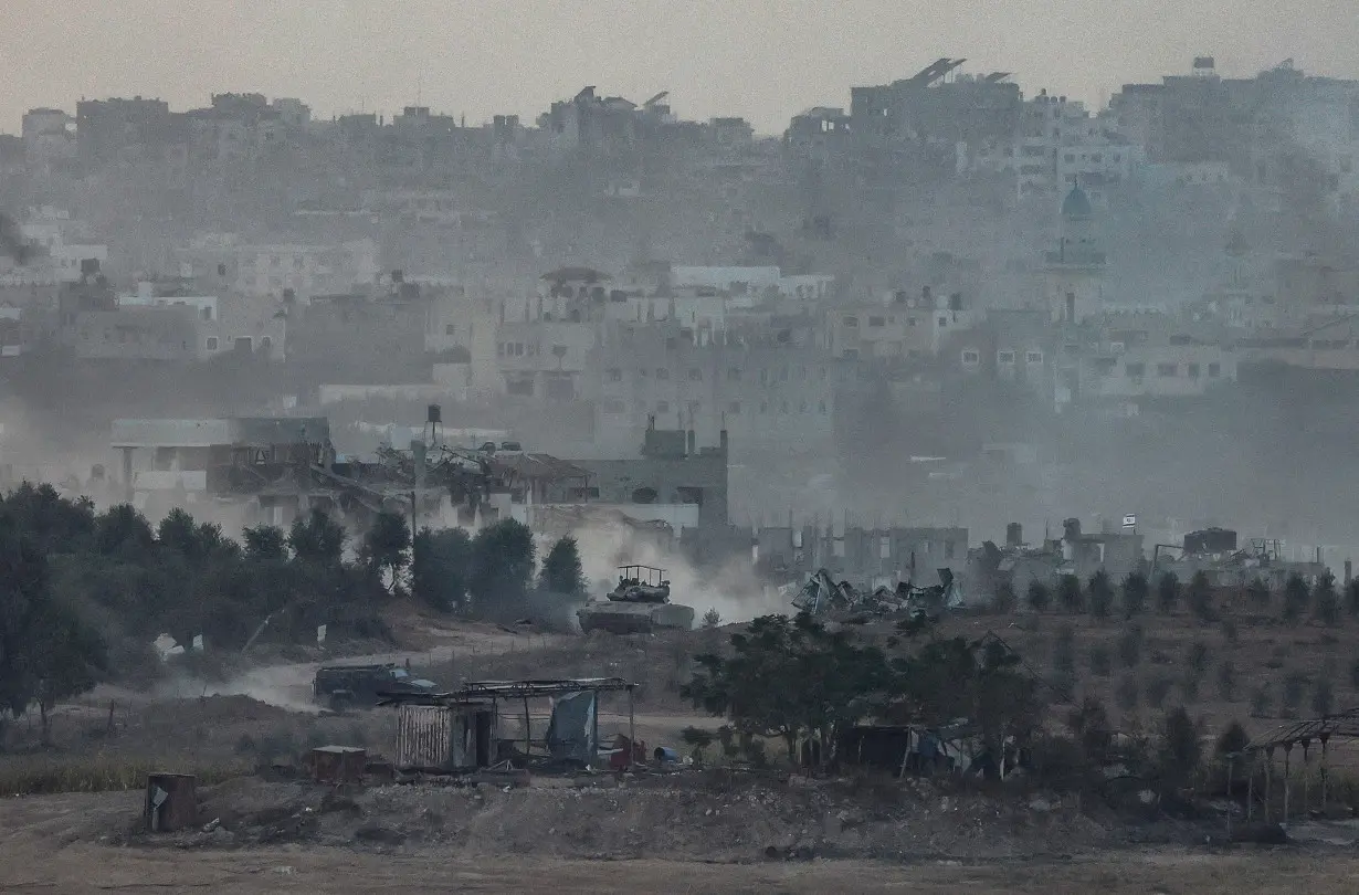 Israeli tank maneuvers in Gaza as seen from Southern Israel, amid the ongoing conflict between Israel and Palestinian group Hamas