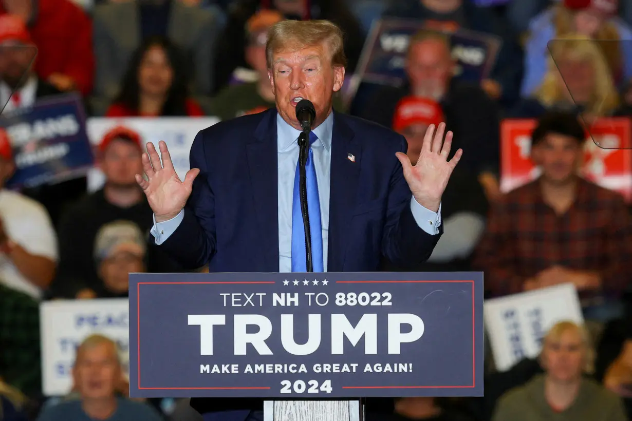 FILE PHOTO: Republican presidential candidate Trump campaigns in New Hampshire