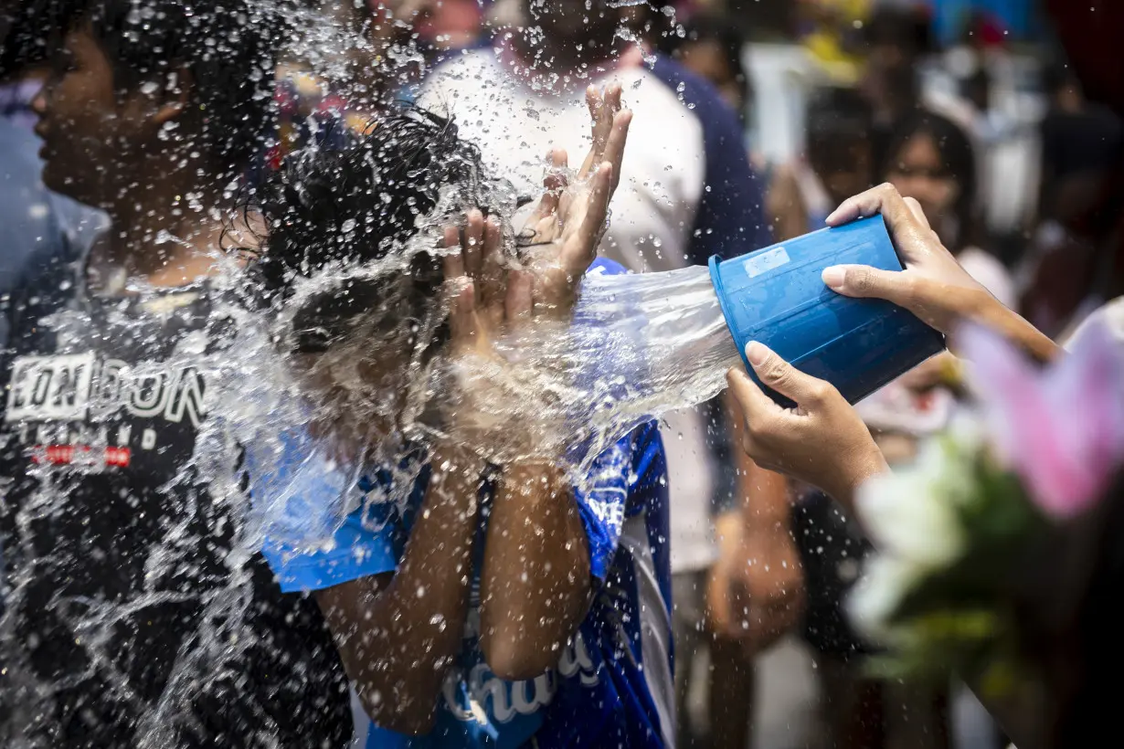 Water guns are in full blast to mark Thai New Year festivities despite worries about heat wave