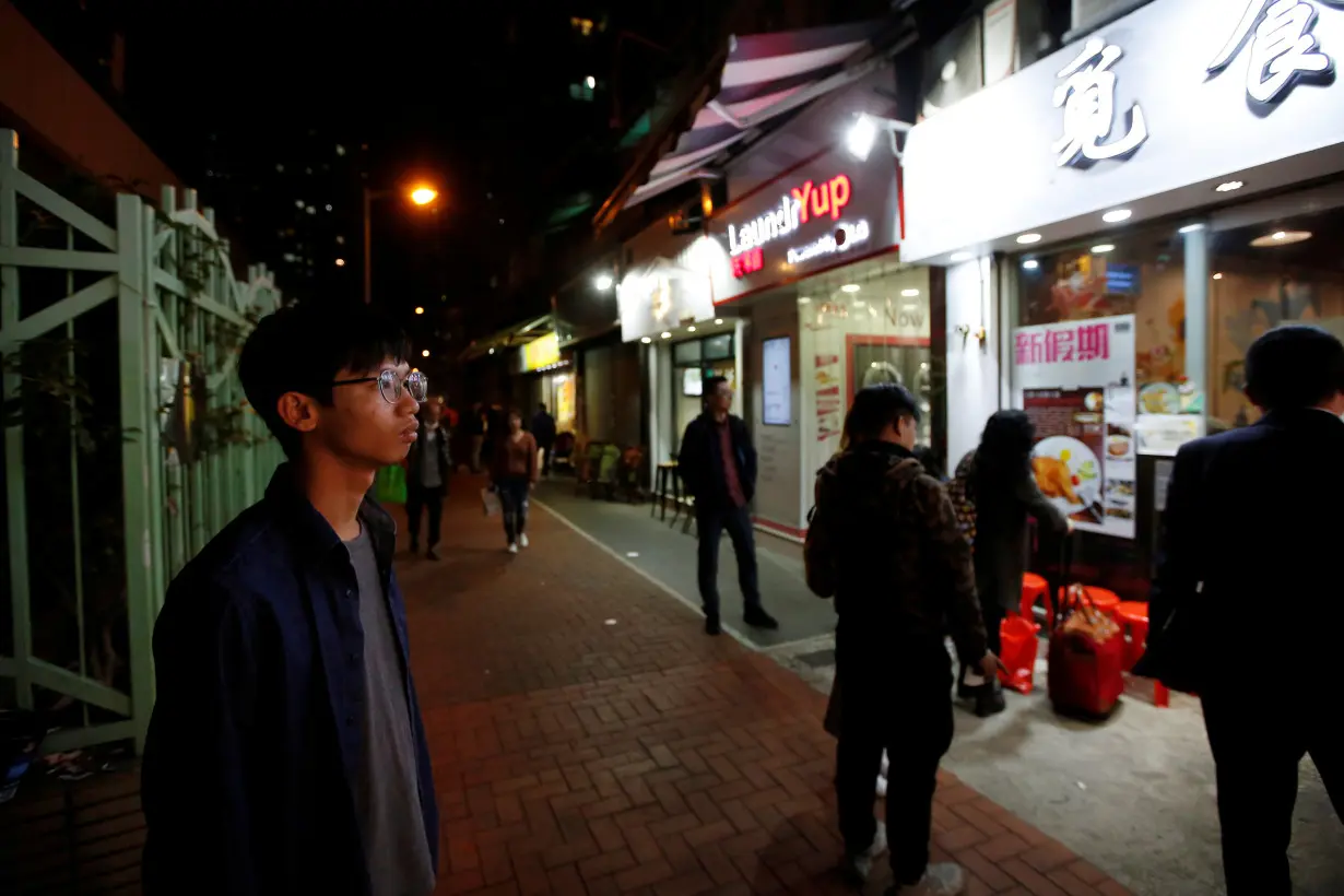 Independence activist Tony Chung is pictured in a street in Hong Kong