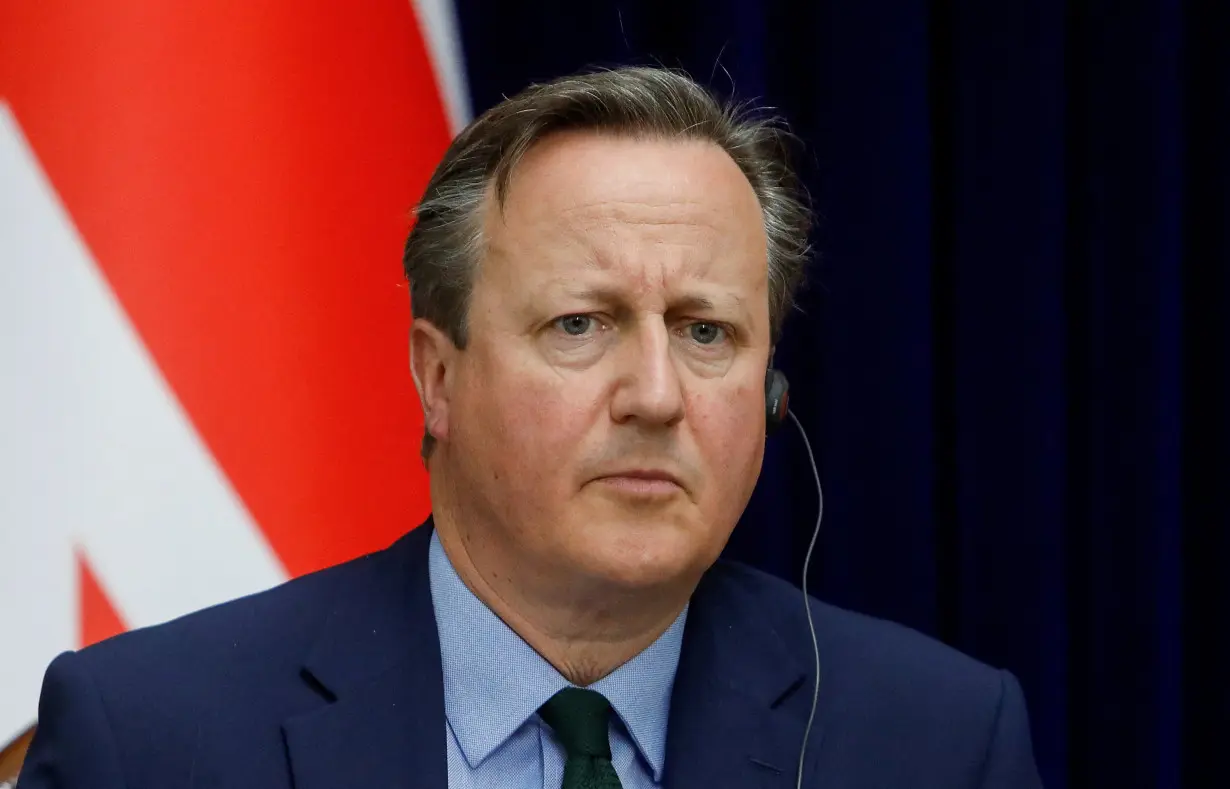 FILE PHOTO: Britain's Foreign Secretary David Cameron speaks during a press conference in Kyrgyzstan