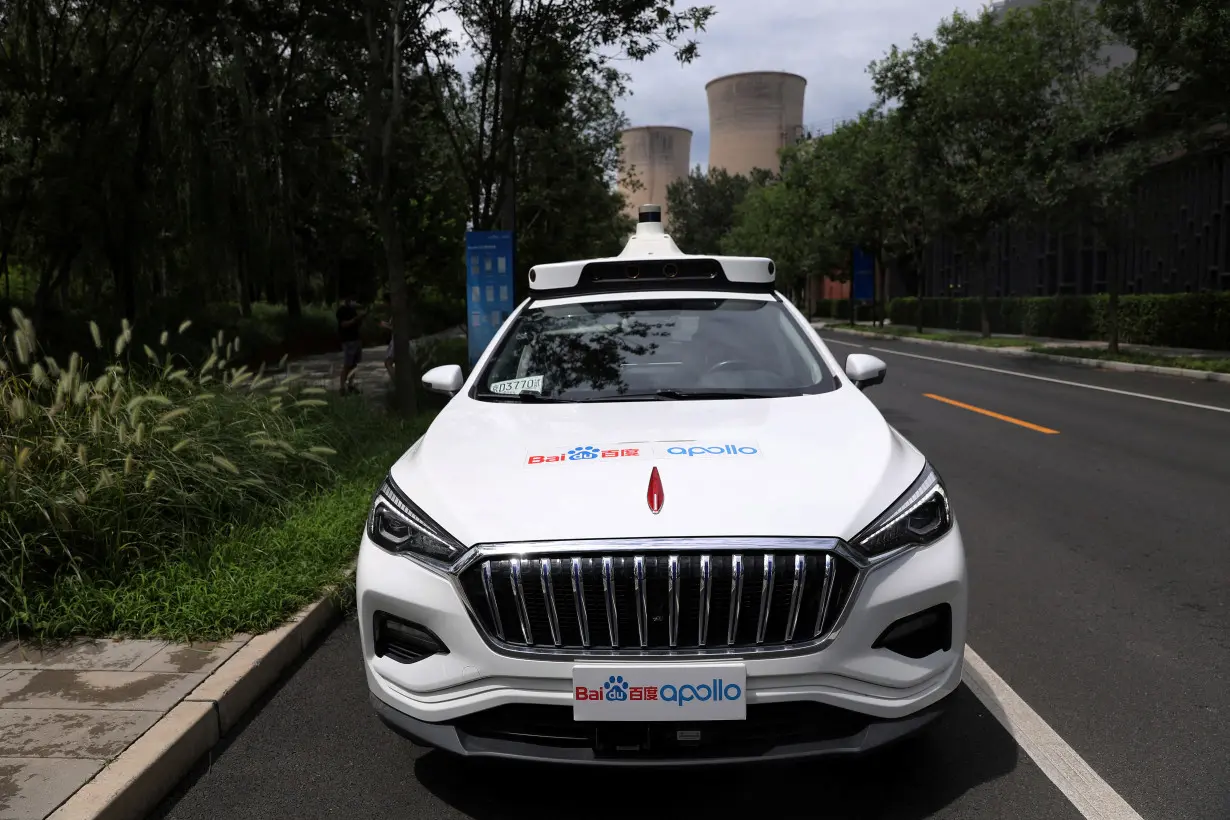 FILE PHOTO: Baidu's Apollo car with an autonomous driving system, which serves for self-driving taxi services, is seen at the Shougang Industry Park in Beijing