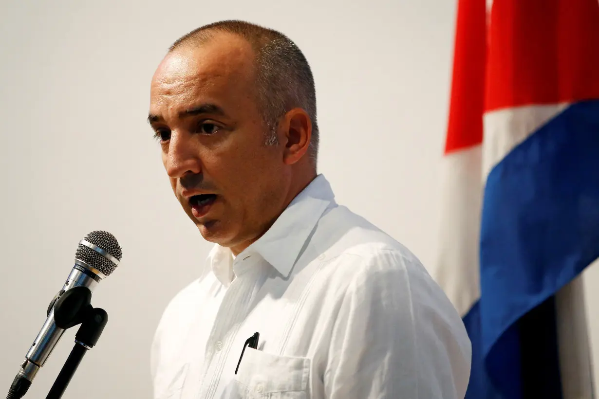 FILE PHOTO: Ernesto Soberon, Foreign Ministry Director of Consular Affairs and Cubans Residing Overseas, delivers a message to the media in Havana