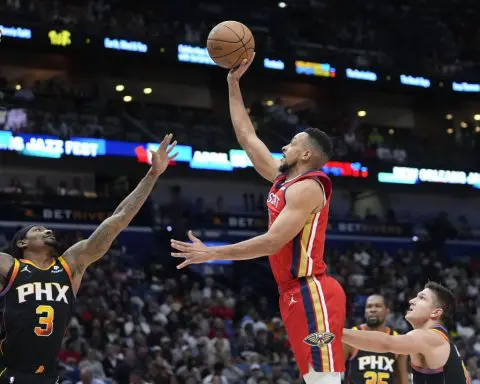 Devin Booker scores 52 points to lift the Suns over the Pelicans 124-111