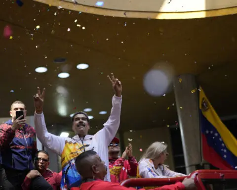 Maduro makes official re-election run while would-be rival struggles to register candidacy