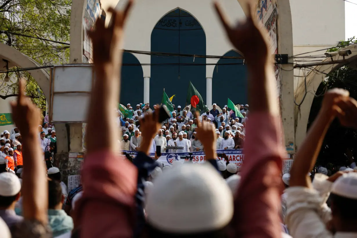 Islami Andolan Bangladesh, a political party, joins in a mass protest march towards the Election Commission, ahead of the election schedule declaration, in Dhaka