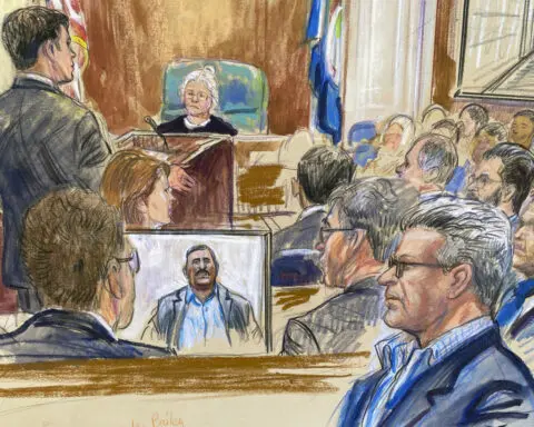 Civilian interrogator defends work at Abu Ghraib, tells jury he was promoted