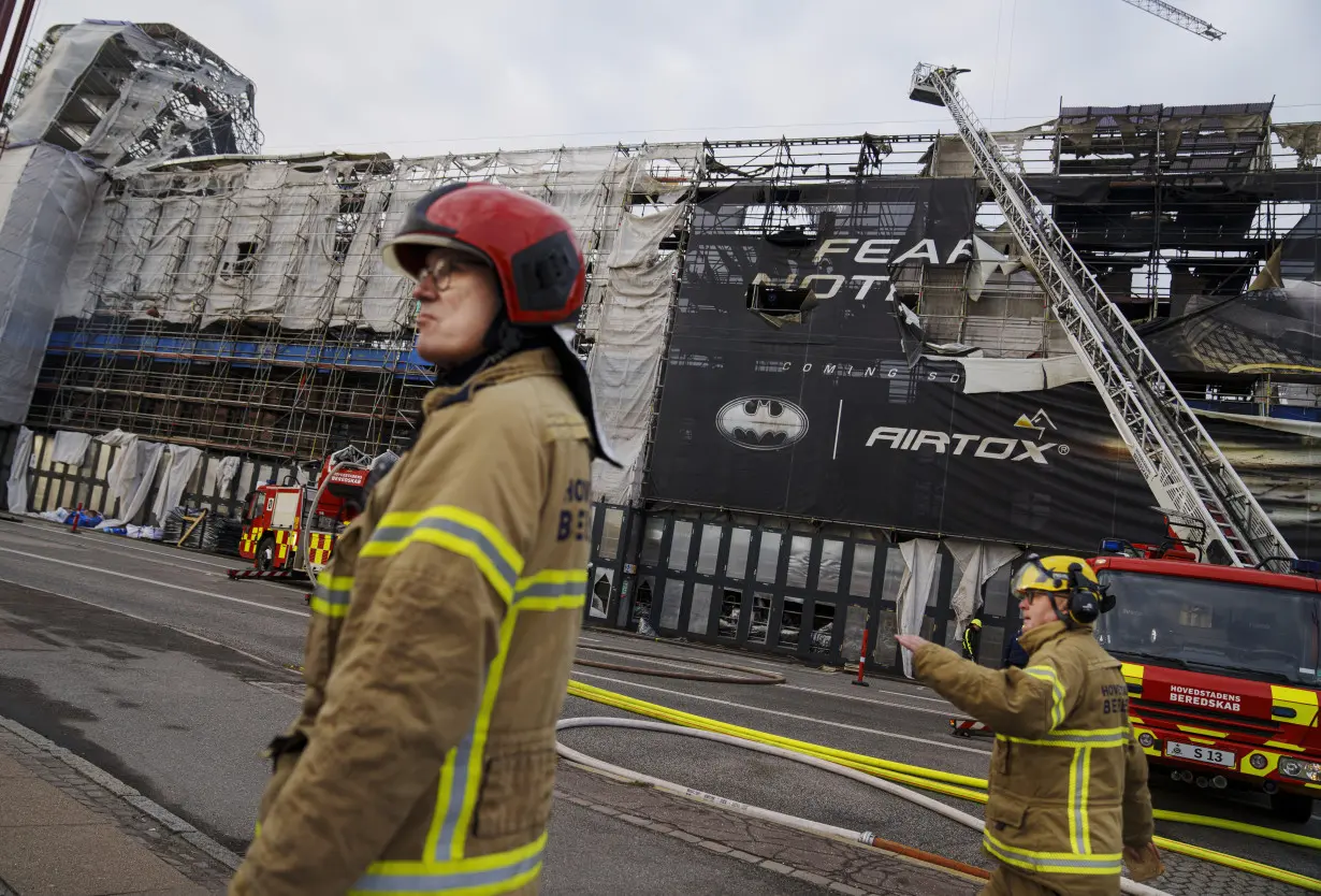 Copenhagen fights the last pockets of a fire that destroyed a 400-year-old landmark