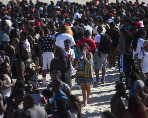 A Georgia beach aims to disrupt Black students' spring bash after big crowds brought chaos in 2023